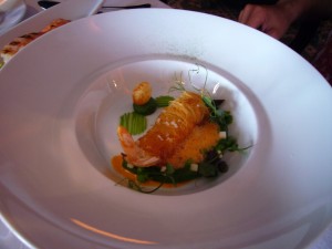 Langoustine in pastry with pea puree and bisque