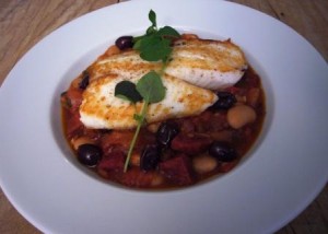 Tilapia with tomato, chorizo and butter bean stew