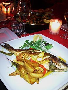dorade Dorade (foreground), Paella (background)